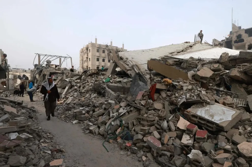 Palestinians search for their loved ones’ remains under the rubble amid Israeli attacks