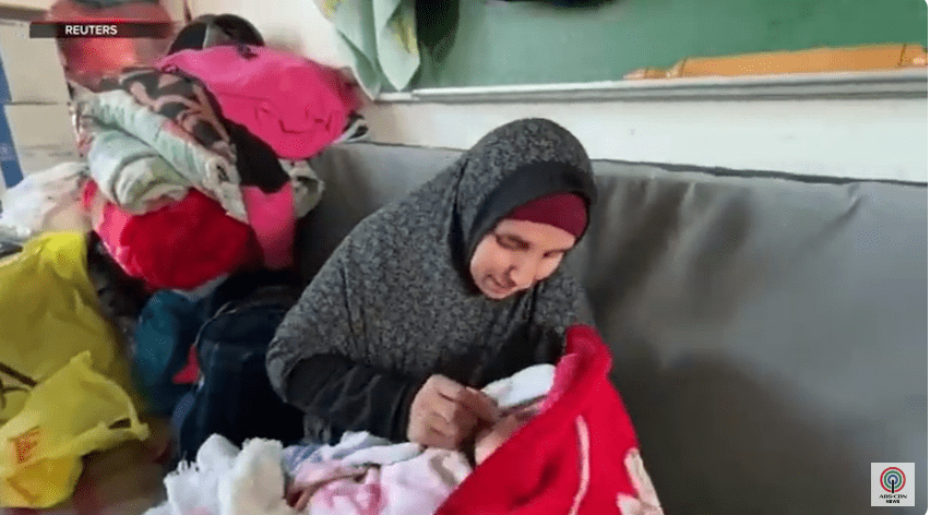 Mother replaces milk with dates for her newborn amid food scarcity in Gaza